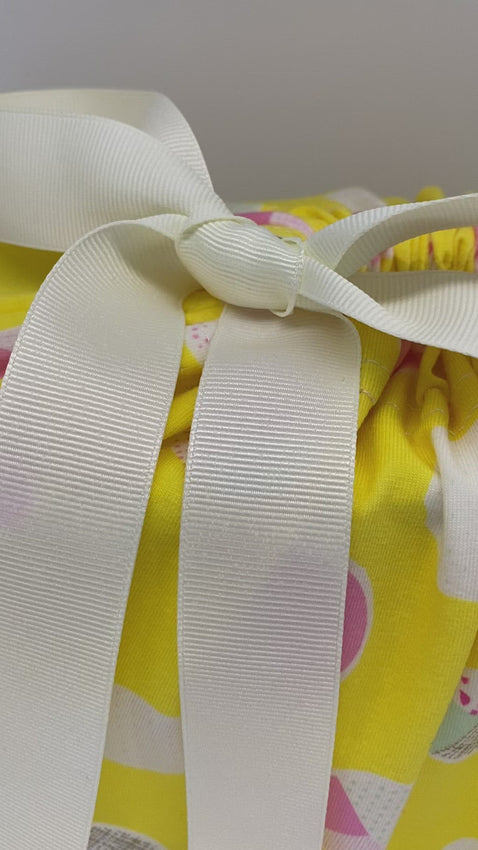 yellow and white dots reusable and stainable fabric gift bag video