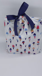 Load and play video in Gallery viewer, medium size fabric gift bag in ice-cream pattern with a ribbon  
